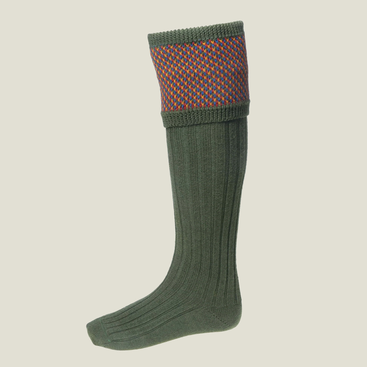 A single ribbed knee-high sock in olive green, featuring a patterned cuff with a red, yellow and blue diamond birdseye design.